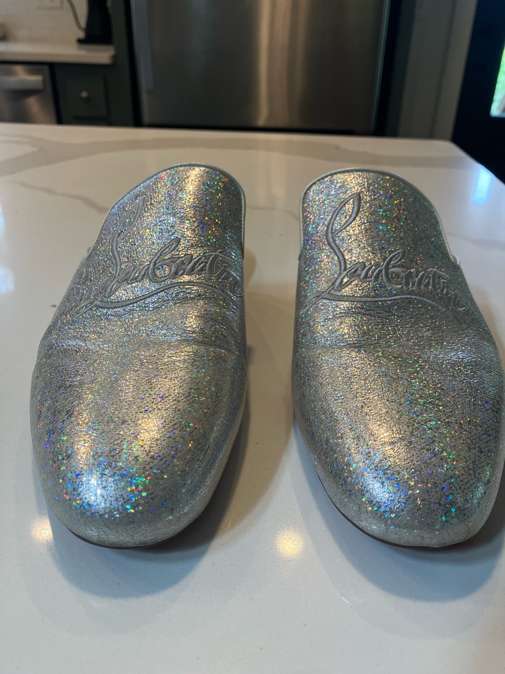 Christian Louboutin  Silver Holographic Slip-On Mules